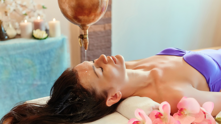 Woman taking Ayurvedic therapy
